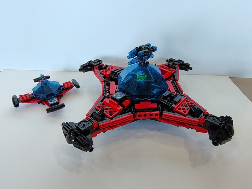 Image of two LEGO models: a 6835 Saucer Scout and a double-size MOC version of the same.